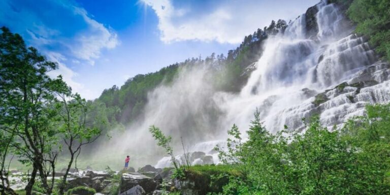 Bergen: Nærøyfjorden, Flåm, and Stegastein Guided Bus Tour - Tvindefossen: the waterfall stop that gives you height and drama