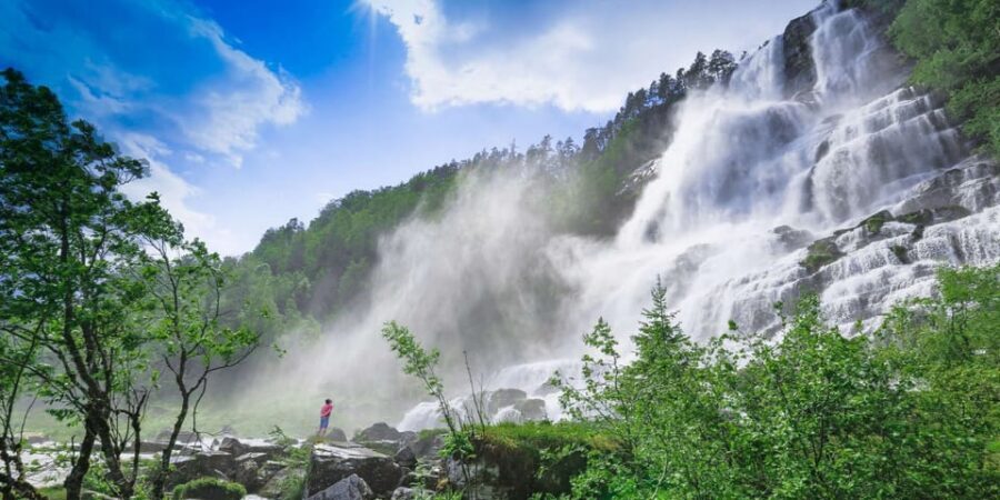 Bergen: Nærøyfjorden, Flåm, and Stegastein Guided Bus Tour - Tvindefossen: the waterfall stop that gives you height and drama