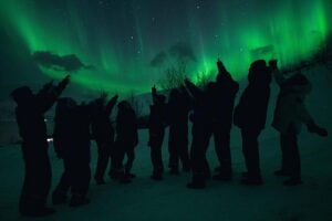 Northern Lights Big Bus Chase with Chasing Lights - The guides and the photo plan: pro results after the lights