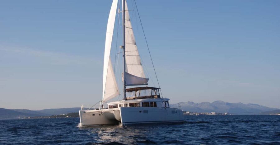 Tromsø: Fjord and Islands Luxury Catamaran Cruise - Arctic Princess comfort: saloon warmth and deck day beds
